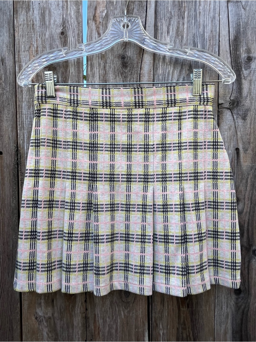 Free People Plaid Pleated Mini Skirt in Pink, yellow, & Black on cream.